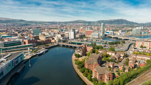 High angle view of river amidst buildings in city