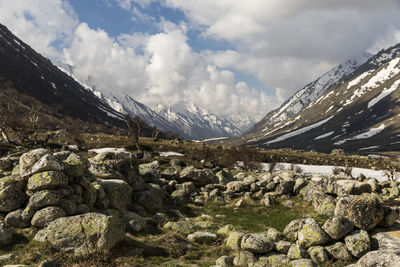 Scenic view of rocky mountains against sky