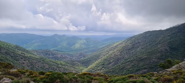 Panoramic view of landscape and mountains against sky