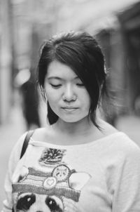 Front view of beautiful woman in city