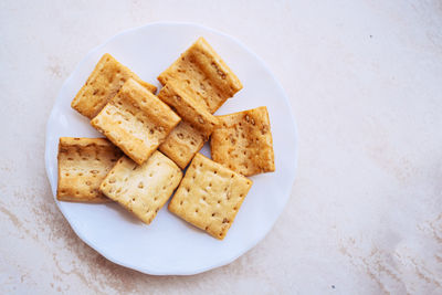 High angle view of cookies in plate on table