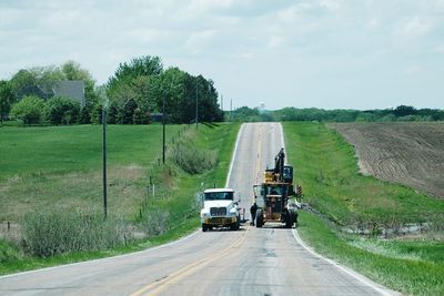 Country road passing through landscape