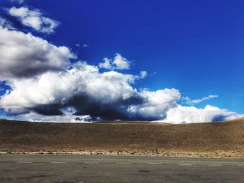 Low angle view of clouds against blue sky