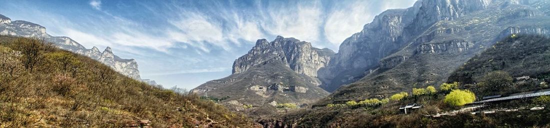 Panoramic view of mountains against sky