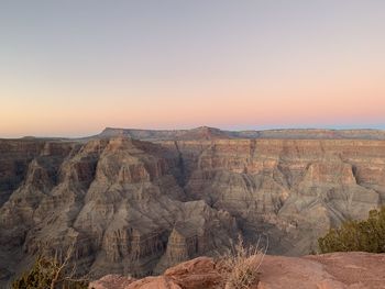 Scenic view of rocky mountains against clear sky