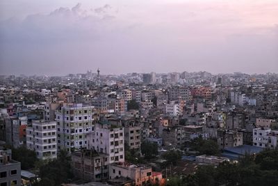 High angle view of buildings in city against sky