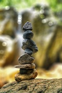 Stack of pebbles on rock