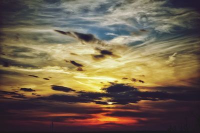 Scenic view of dramatic sky during sunset