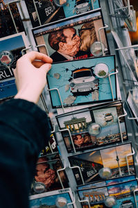 High angle view of man holding camera