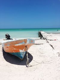 Scenic view of beach against clear sky