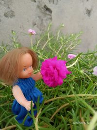 Cute girl with purple flowers