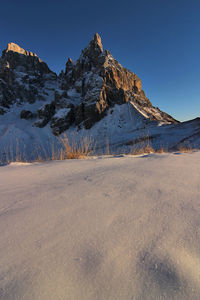 Italy, dolomities unesco heritage. scenic view of snowcapped  montains against clear sky. 