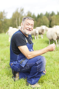 Senior farmer on pasture, smaland, sweden