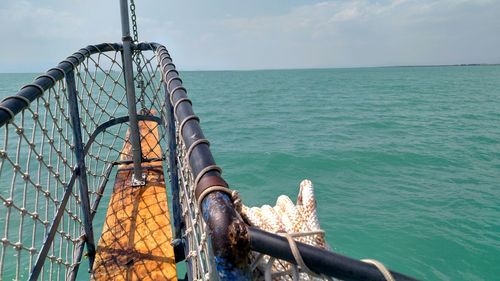 Ship in sea against sky