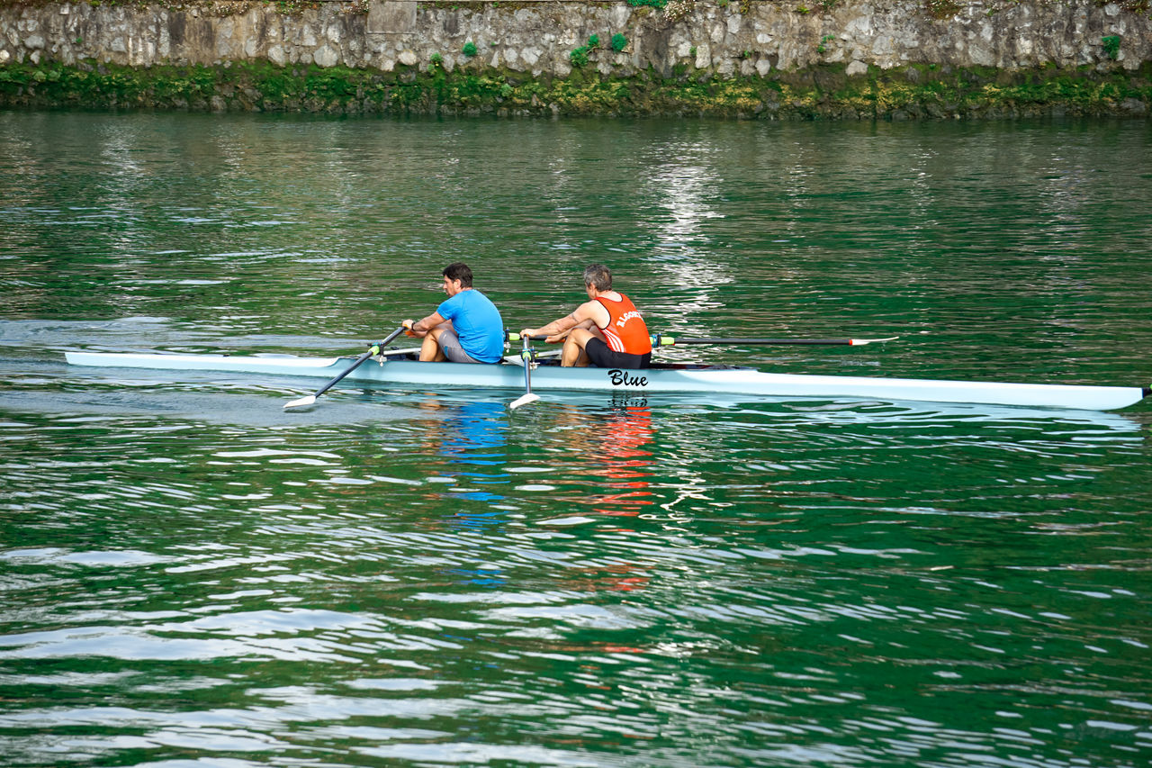 water, nautical vessel, canoeing, boat, transportation, boating, men, oar, nature, leisure activity, two people, canoe, vehicle, adult, day, paddle, lifestyles, rowing, lake, togetherness, mode of transportation, sports equipment, sports, waterfront, recreation, kayak, outdoors, sitting, adventure, motion, women, trip, watercraft, travel, vacation, holiday, kayaking, rippled, weekend activities, water sports, beauty in nature
