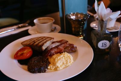 Close-up of breakfast served on table