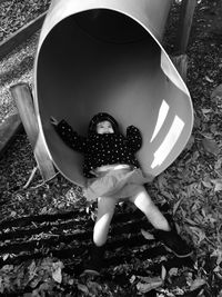 High angle view of woman playing in playground