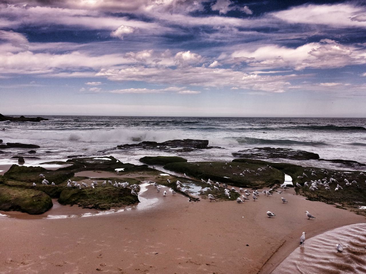 sea, water, sky, beach, horizon over water, tranquil scene, scenics, shore, tranquility, cloud - sky, beauty in nature, nature, cloudy, cloud, sand, idyllic, wave, coastline, rock - object, outdoors