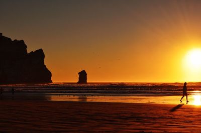 Scenic view of sea at sunset