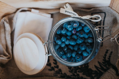 Midsection of woman holding coffee