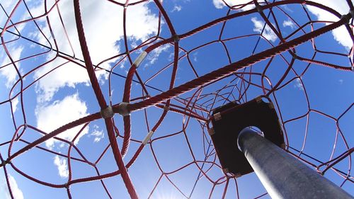 Low angle view of bare tree against sky