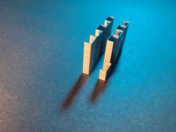 High angle view of blue toy against white background