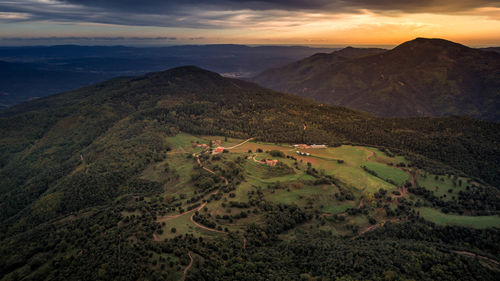 High angle view of field against sky during sunset