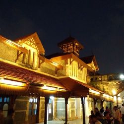 Low angle view of illuminated building at night