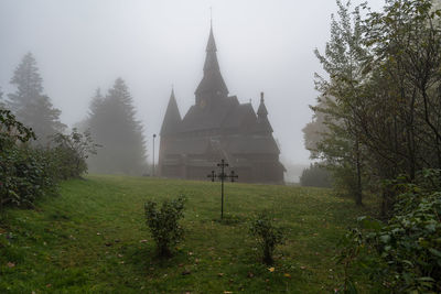 View of temple against building