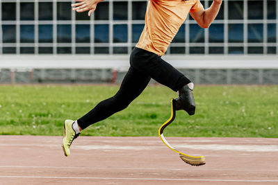 Full length of man playing soccer