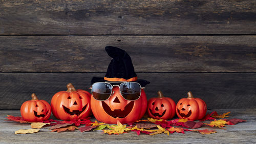 Pumpkin on wooden table during halloween