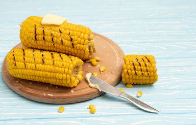 Close-up of yellow cake in plate on table