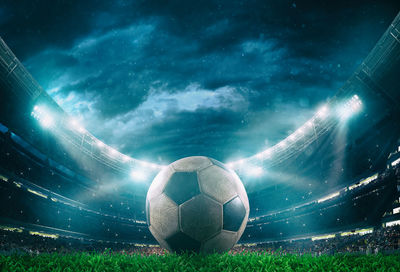 Soccer ball on field at night