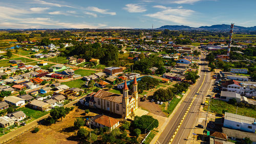 High angle view of buildings in city against sky