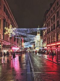 People in city at night