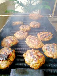 Close-up of meat on barbecue grill