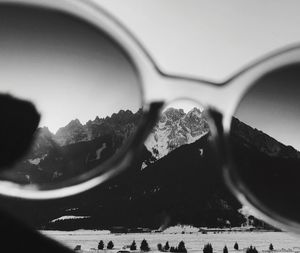 Close-up of water in mountains against sky