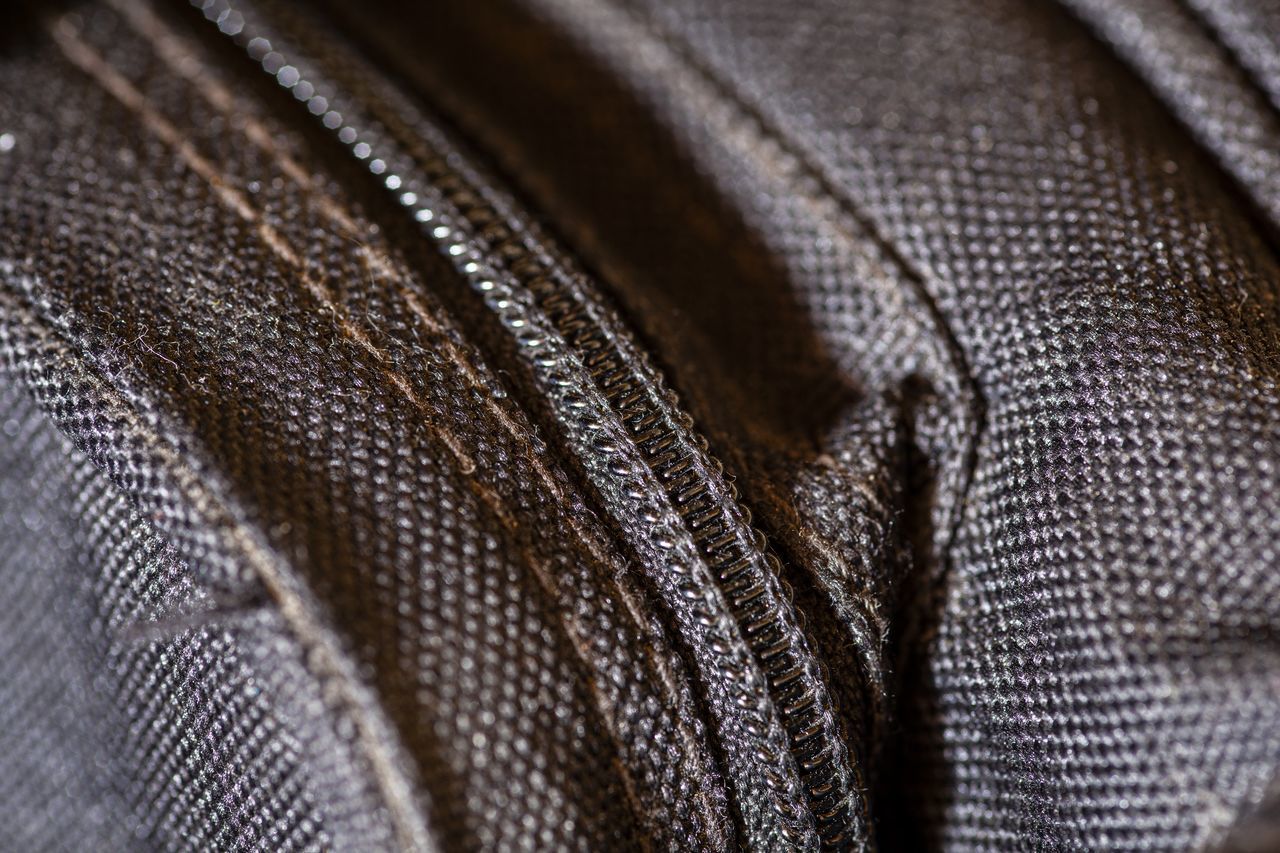 brown, clothing, close-up, textile, jacket, full frame, no people, backgrounds, indoors, outerwear, textured, fashion, pattern, leather, zipper, selective focus, casual clothing, business, garment, business finance and industry, material, button down shirt