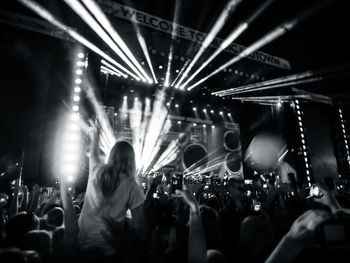 People enjoying music concert