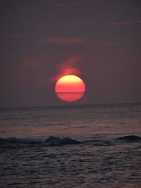 Scenic view of sea at sunset