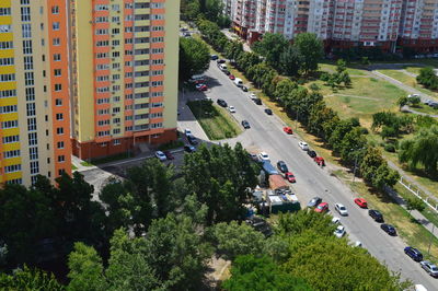 High angle view of street amidst buildings in city