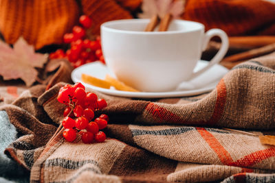 Close-up of coffee cup on table