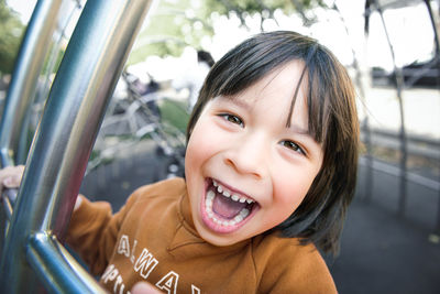 Portrait of young woman in car