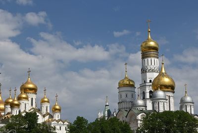 View of buildings against cloudy sky