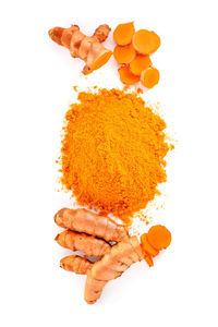 High angle view of orange leaf against white background