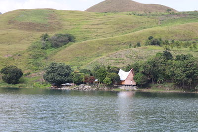 Scenic view of lake by mountain