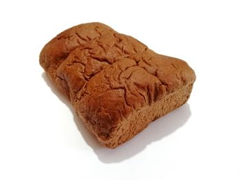 Close-up of chocolate cake against white background