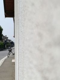 Man riding bicycle on city street