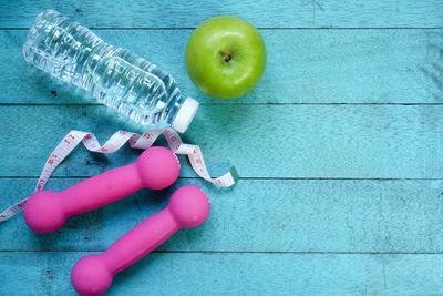 Close-up of exercise equipment on blue table