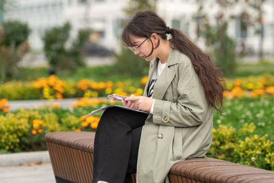 Young woman using mobile phone